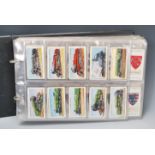 A collection of vintage 20th Century Wills cigarette cards in full sets stored within plastic