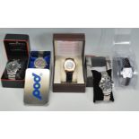 A collection of Gents unused dress wrist watches to include an Earnshaw automatic with skeleton