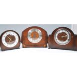 A group of three early 20th Century 1930's oak case mantel clocks to include a Smiths clock of round