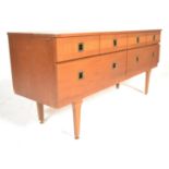 A vintage retro 20th Century teak wood sideboard credenza in the manner of Mogens Kolo.  Four over
