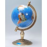 A vintage retro 20th century lapis lazuli type semi precious stone inlay desk top globe raised on