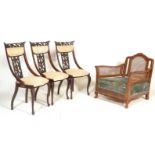 A 1920's mahogany Queen Anne revival bergere armchair. Blue velour seat with caned back rest and