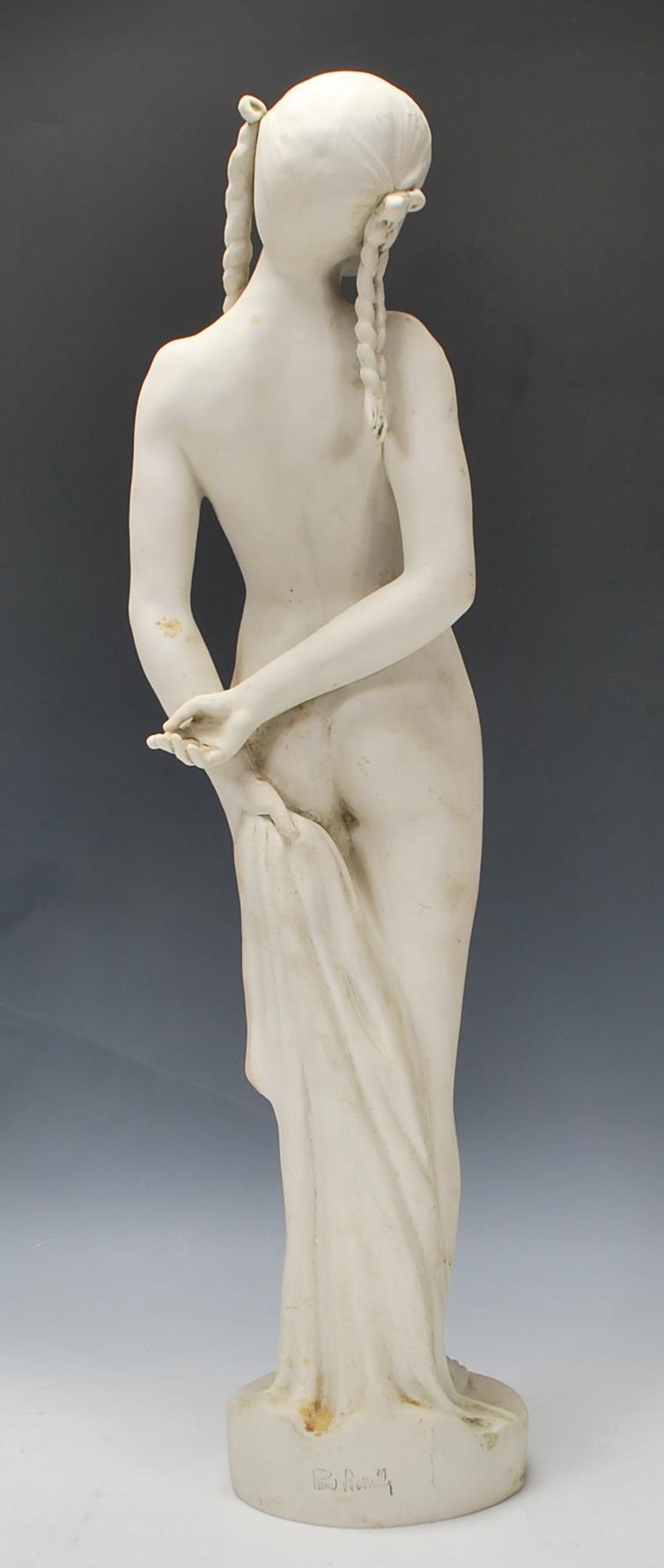 A 20th Century blanc de chine ceramic bisque standing figurine depicting a nude woman having plaited - Image 3 of 6