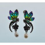 A pair of stamped 925 silver plique a jour earrings in the form of dragonflies set with