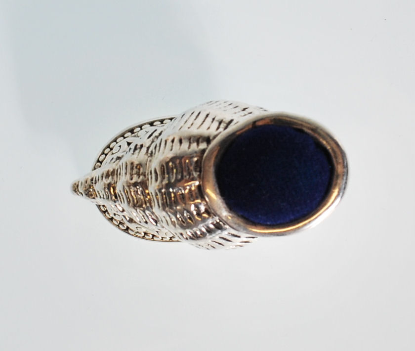 A stamped 925 silver pin cushion in the form of a conch shell raised on a footed base with a blue - Image 6 of 7