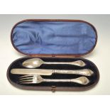 A Victorian 19th century set of 3 silver hallmarked knife, fork and spoon cased presentation set.