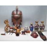 A collection of unusual African tribal items to include a large Ashanti face mask, wooden carved