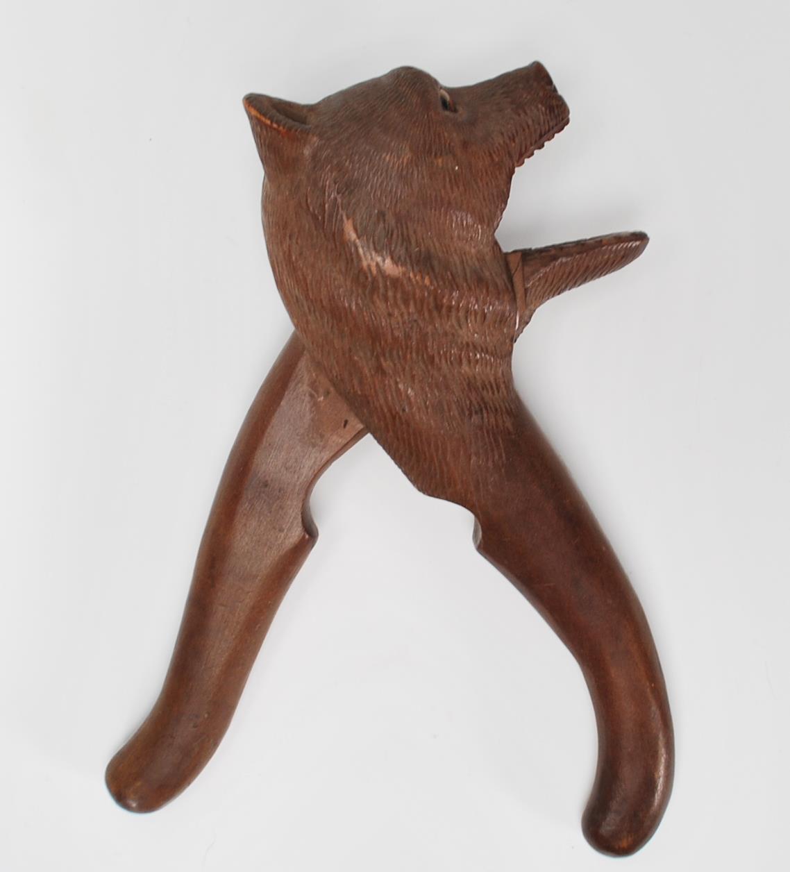 An early 20th Century black forest wooden nut cracker in the form of a bear having carved - Image 6 of 6