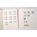 A collection of world stamps dating from the 19th Century Victorian era through to ERII across two