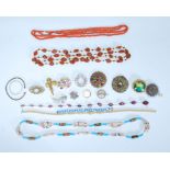 A collection of vintage costume jewellery to include glass beaded necklace, coral necklace, filigree