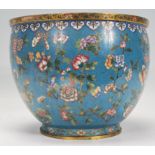 A late 19th Century circa 1880 Chinese Cloisonne brass and copper planter having a blue enamelled