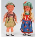 Two vintage mid 20th Century souvenir German / Austrian wind up toy dolls dressed in traditional