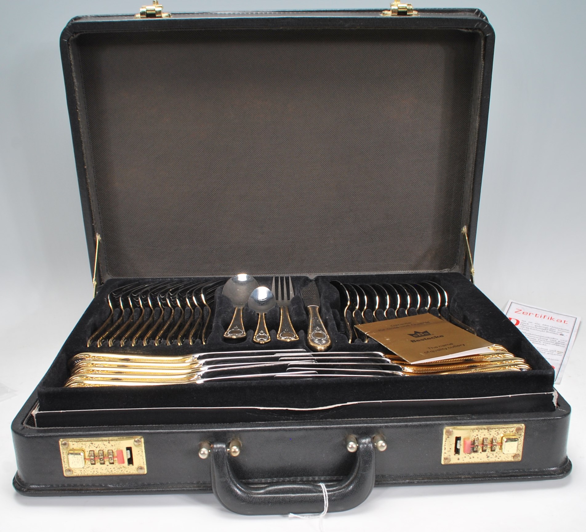 A cased 60 piece dinner table canteen of cutlery by SBS Besteckvertriebs-GmbH Solingen. Decorated in