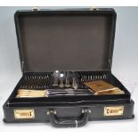 A cased 60 piece dinner table canteen of cutlery by SBS Besteckvertriebs-GmbH Solingen. Decorated in
