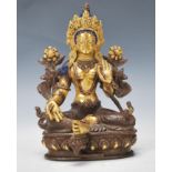 An early 20th Century Tibetan gilt bronze deity sculpture of Amitabha. Seated figure with crossed