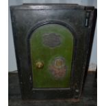 A large 19th Century Victorian large wrought iron fire resistant safe with keys, brass handle to the