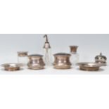 A collection of silver hallmarked Collett & Anderson dressing table items set with tortoise shell