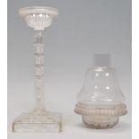 A late 19th century Victorian Cricklite S. Clarke, Pyramid Night Light, having a cut glass base with