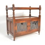 A 20th Century  oak Jaycee lead glazed two-door buffet / drinks trolley, two tiers over glazed