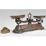 A pair of 19th Century Fairbanks Birmingham balance scales having green and red decoration