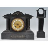 A late 19th / early 20th Century slate mantel clock having a pediment to top with columnal
