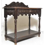 A Victorian 19th century carved oak ' green man ' writing table desk. Raised on turned legs united