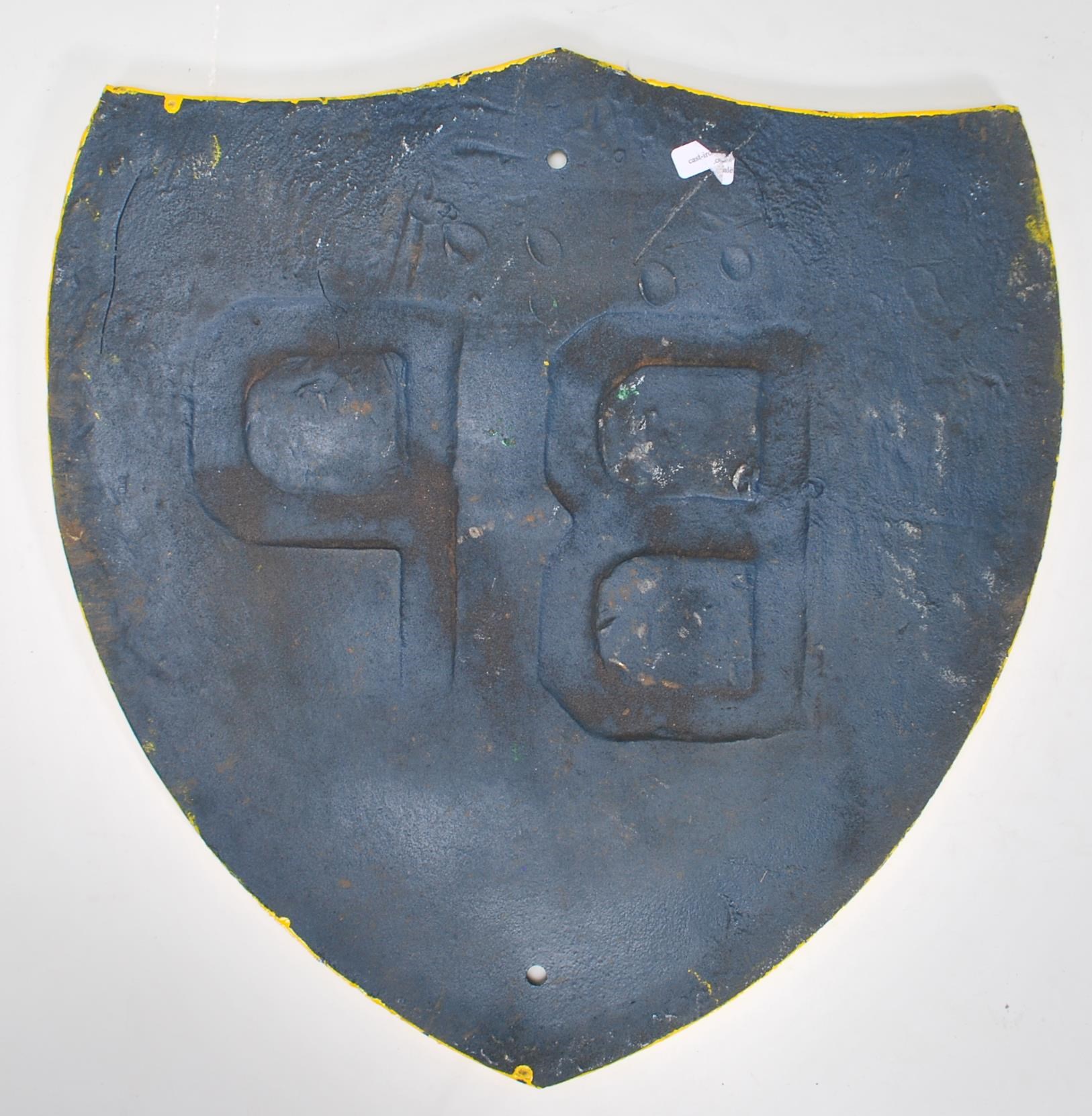 A vintage 20th Century cast iron BP reproduction advertising sign of shield form having a green - Image 2 of 2