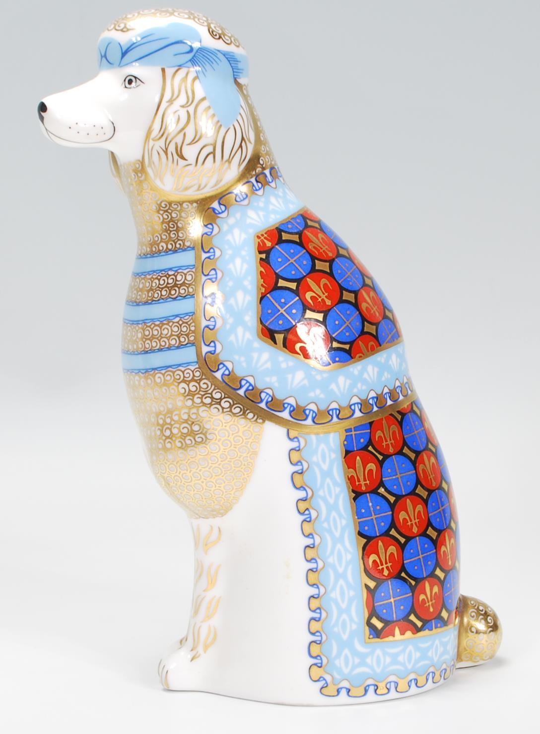 A Royal Crown Derby Porcelain figurine from the National Dogs series ' French Poodle ' Stamped to - Image 4 of 7