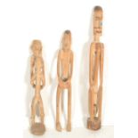 A collection of 20th century Burmese tribal wooden carvings. Each  being carved from a single