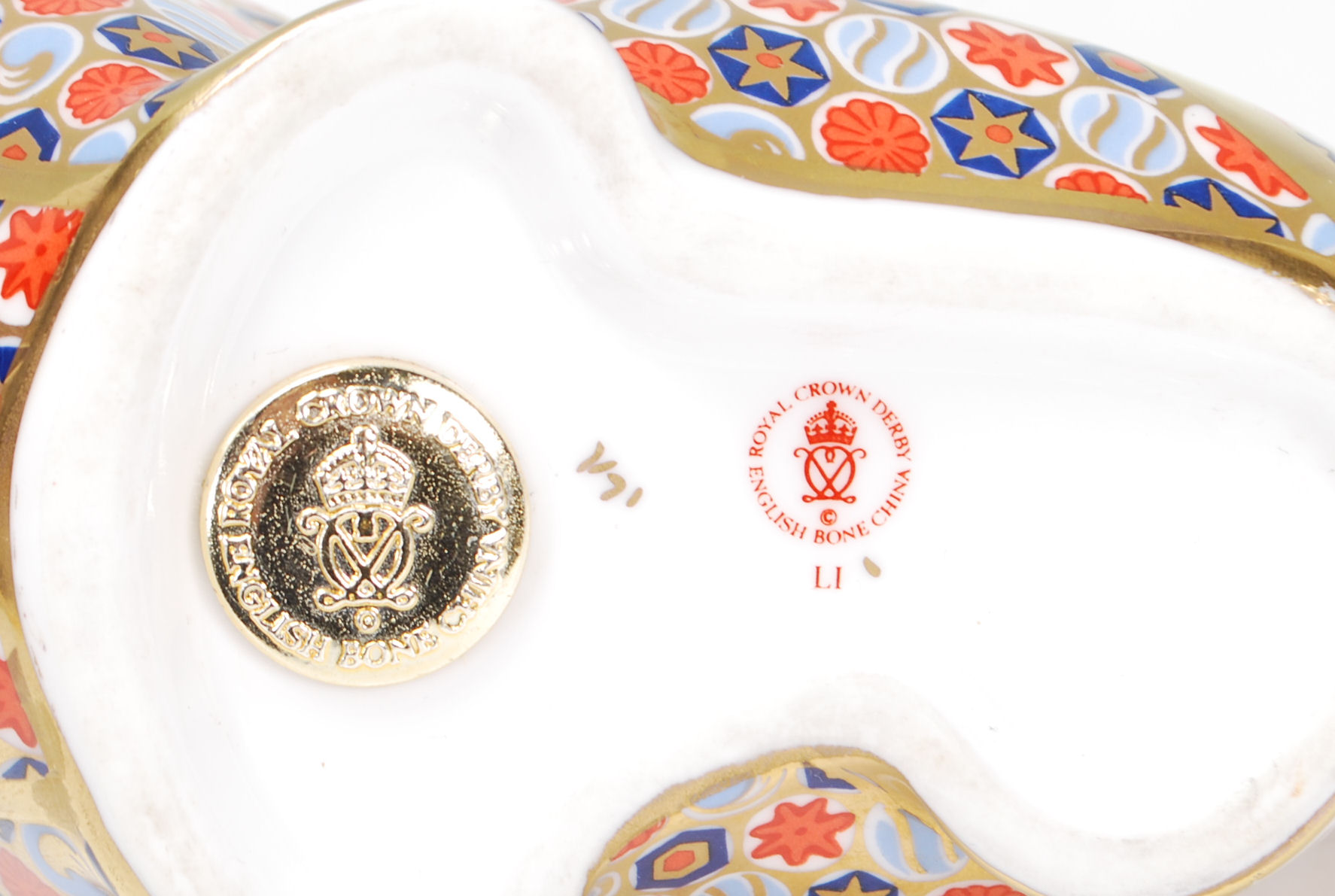 A Royal Crown Derby porcelain paperweight figurine of a walrus being stamped to the underside and - Image 7 of 7