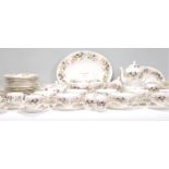 A Wedgwood ' Hathaway Rose ' tea and dinner service comprising cups, saucers, plates, tureen, coffee