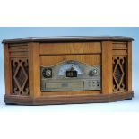 A contemporary 20th Century wooden cased Hi - Fi system modelled as a vintage table top