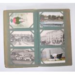 An early 20th Century Art Deco postcard album filled with postcards, all with messages to the same