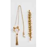 A fashion jewellery demi parure set to include a gold tone necklace in the form of two horses with a