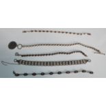 A selection of silver bracelets to include two twist chain bracelets, a silver gate link bracelet, a