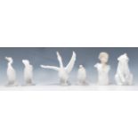 A collection of Lladro figurines to include a Polar Bear, 4 swans / geese and a praying winged