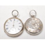 A Chester hallmarked silver open faced key wind pocket watch having inset white enamel dial together