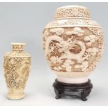 A 20th Century Chinese heavily carved ginger jar in the manor of cinnabar. Cover atop the bulbous