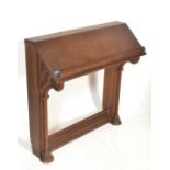 A late 19th century oak ecclesiastical church pulpit lectern seat, panelled front with carved detail