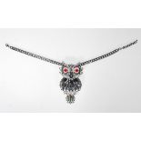 A Butler and Wilson fashion jewellery necklace having a large pendant brooch in the form of an owl