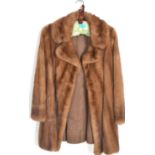 A 20th Century vintage ladies mink fur swing coat by the national fur company, hook and eye