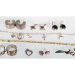 A selection of mixed stamped 925 silver jewellery to include a pair of hoop earrings, a pair of blue
