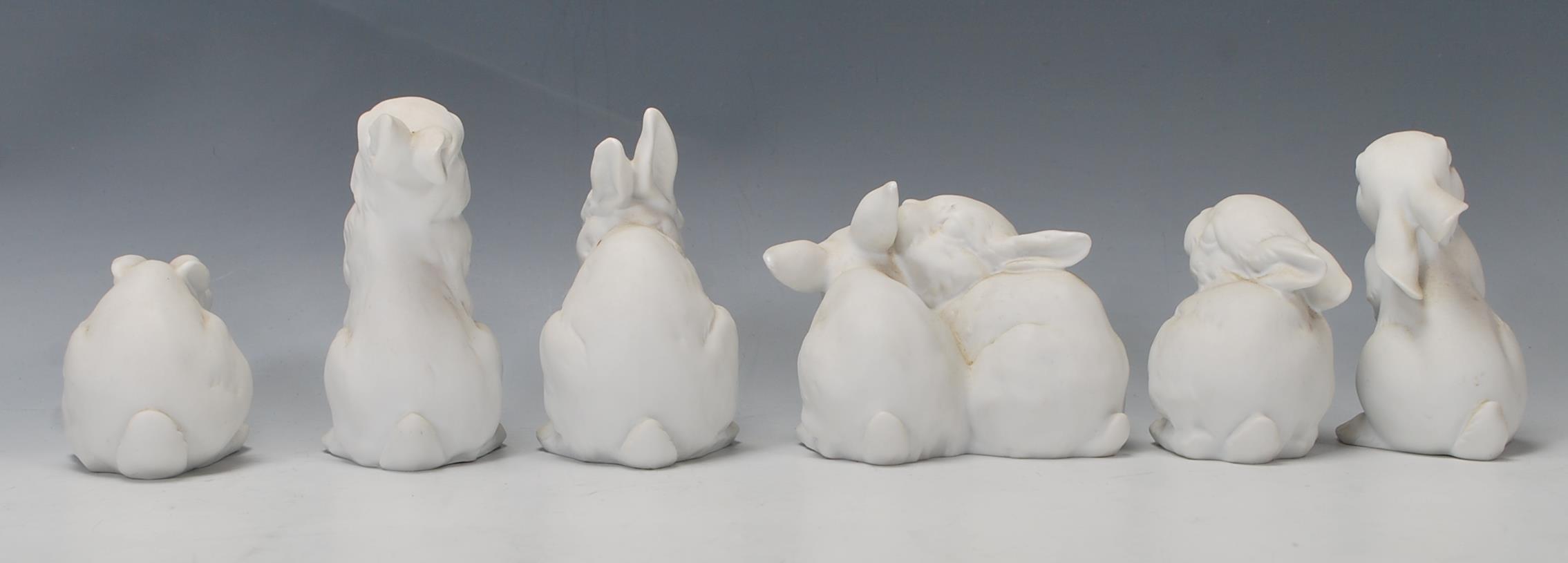 A group of six Kaiser porcelain figures in the form of rabbits in various positions, one being - Image 3 of 7