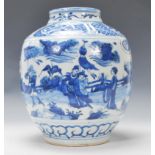 An 18th / 19th century Chinese blue and white bulbous base decorated with scenes of master seated