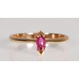 A stamped 9ct gold ring set with a marquise cut pink stone. Weight 2.0g. Size L.5.