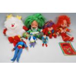 A collection of four retro 20th Century Mattel Rainbow Bright dolls and plush toys to include