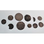 A collection of silver hammered struck coins to include a 1606 James I, Henry III, Alexander III,