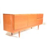 An original retro vintage 20th century teak wood sideboard raised on tapering legs with two