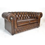 A good quality Chesterfield leather two seat sofa settee by Thomas Lloyd. Button backed leather