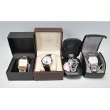 A collection of four gents dress wristwatches to include a Earnshaw automatic having a white dial